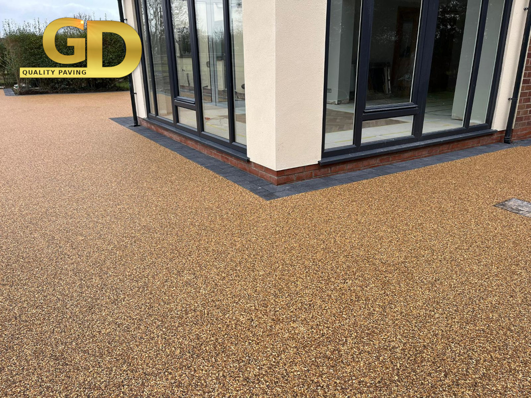 Resin coated decorative aggregate driveway surfaces.